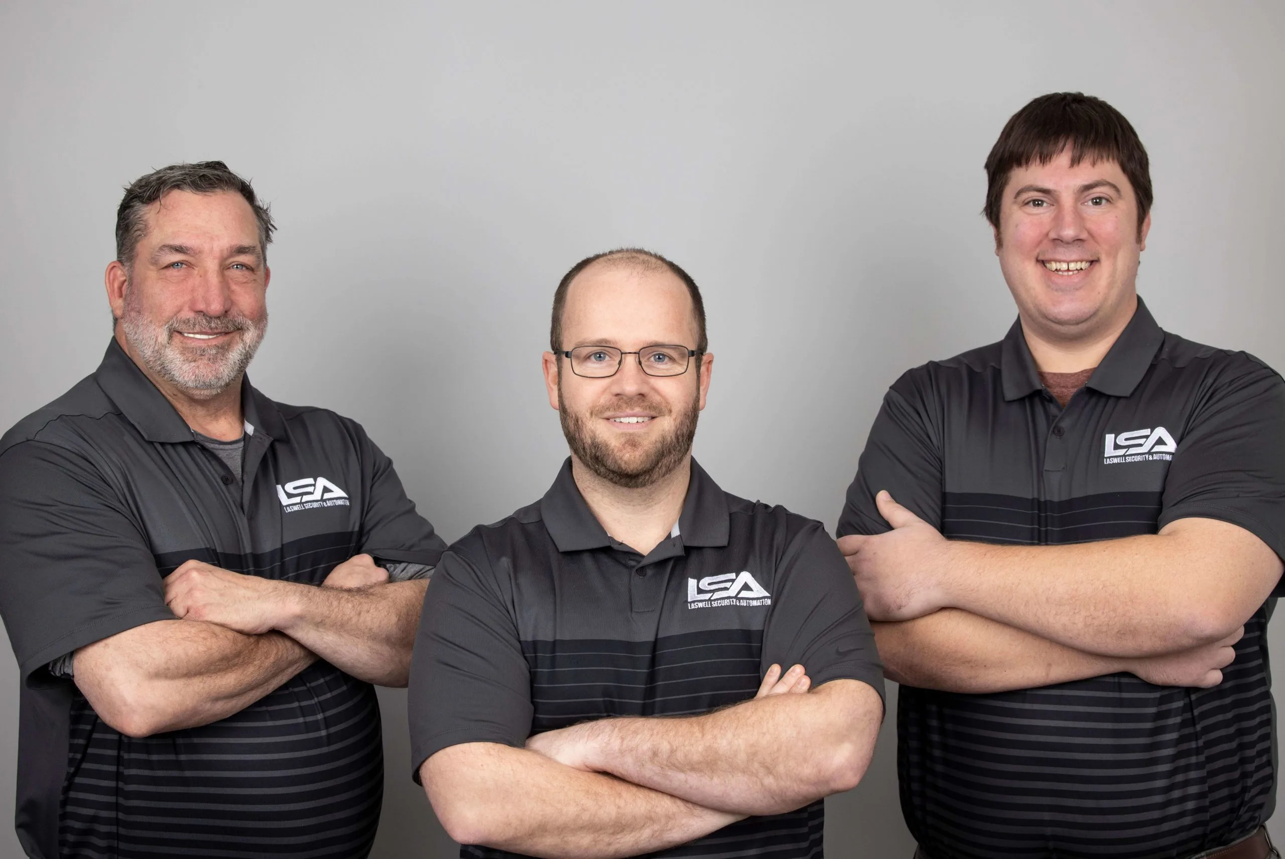 Picture of three team members of Laswell Security