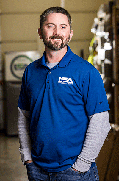 Headshot of David Pohler, Laswell Security and Automation employee in Louisville, wearing a blue LSA-branded polo, representing the team’s expertise in providing the best security solutions.