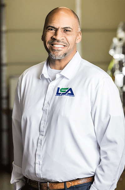 Headshot of Walter Collins, Laswell Security and Automation employee in Louisville, wearing a white LSA branded button up, representing the team’s expertise in providing the best security solutions.